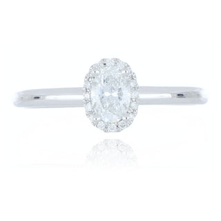 Platinum 0.40ct diamond oval halo ring