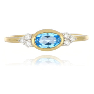 9ct yellow gold blue topaz and diamond ring