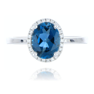 9ct white gold london blue topaz and diamond halo ring