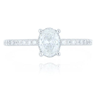 Platinum 0.50ct diamond solitaire ring with diamond set shoulders