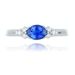 Platinum 0.65ct sapphire and diamond 3 stone style ring