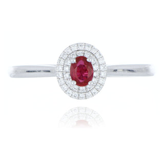 Platinum 0.25ct ruby and double diamond halo ring