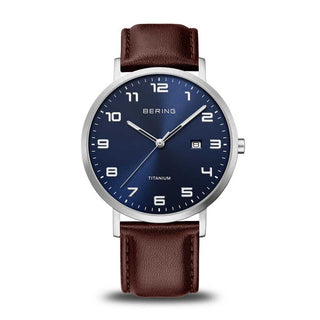 Bering Watches Bering Gents 40mm Brushed Titanium Blue Face Quartz Watch With A Brown Leather Strap 6401694