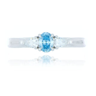 Platinum 0.26ct Enhanced Light Blue Diamond 3 Stone Ring
