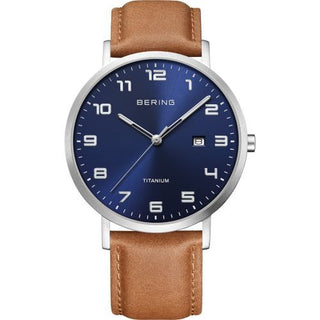 Bering Gents Titanium And Blue Watch With A Brown Leather Strap